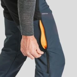 Quechua Waterafstotende Warme Wandelbroek Met Sneeuwvangers Heren SH520 X-WARM STRETCH -Aanbiedingen Sportief Leven Winkel waterafstotende warme wandelbroek met sneeuwvangers heren sh520 x warm stretch 4
